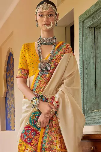 Cream bandhani embroidered silk blend designer saree
