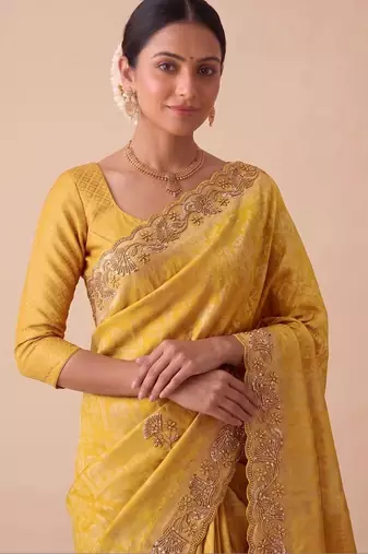 Yellow woven design beads and stones silk blend banarasi saree
