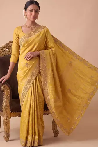 Yellow woven design beads and stones silk blend banarasi saree
