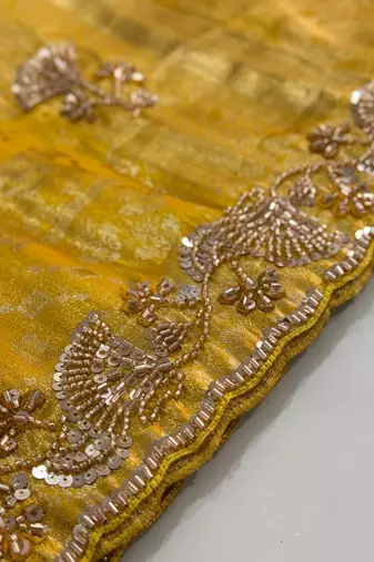 Yellow woven design beads and stones silk blend banarasi saree