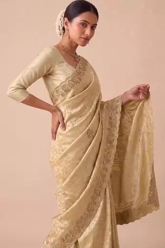 Gold woven design beads and stones silk blend banarasi saree