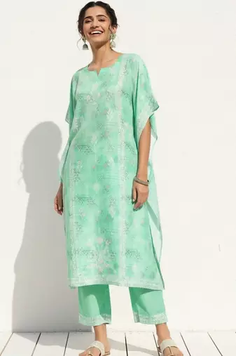women ethnic motifs printed regular kurta with trousers