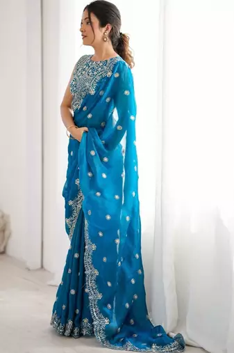 Teal embellished zari silk blend designer saree