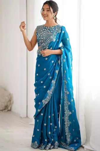 Teal embellished zari silk blend designer saree