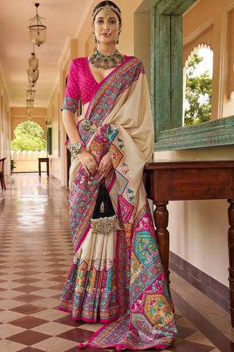 Cream ethnic motifs silk blend designer saree