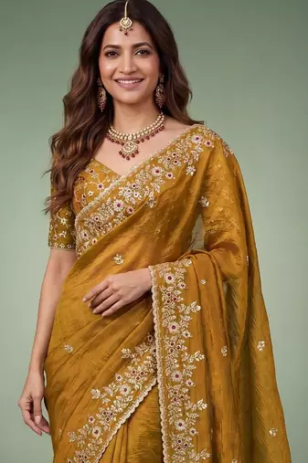 Gold embellished embroidered  chiffon heavy work saree