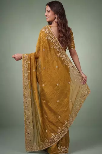 Gold embellished embroidered  chiffon heavy work saree