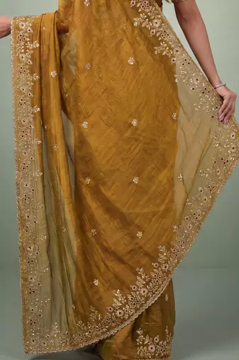 Gold embellished embroidered  chiffon heavy work saree