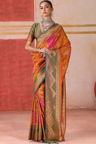 Orange ethnic motifs woven design zari pochampally saree