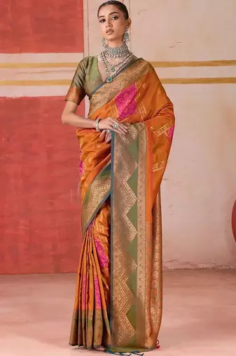 Orange ethnic motifs woven design zari pochampally saree