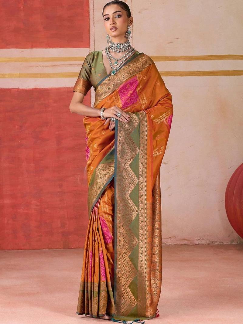Orange ethnic motifs woven design zari pochampally saree