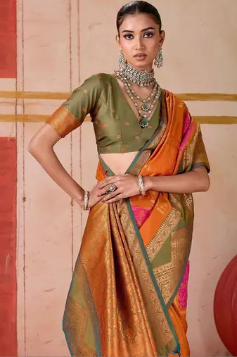 Orange ethnic motifs woven design zari pochampally saree