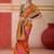 Orange ethnic motifs woven design zari pochampally saree