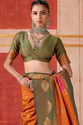 Orange ethnic motifs woven design zari pochampally saree