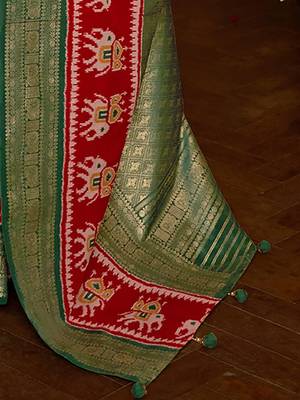 Beige ethnic motifs woven design patola saree 4