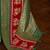 Beige ethnic motifs woven design patola saree