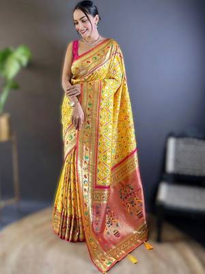 Yellow woven design zari silk blend designer patola saree 1