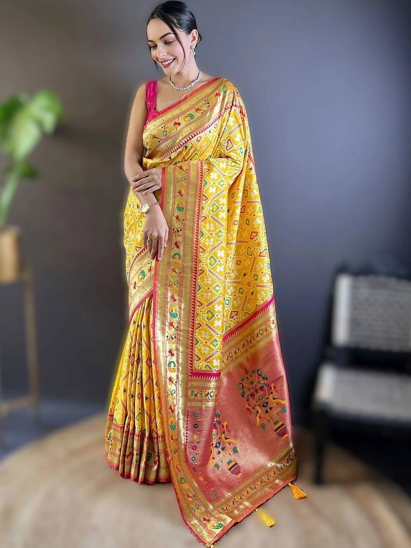 Yellow woven design zari silk blend designer patola saree