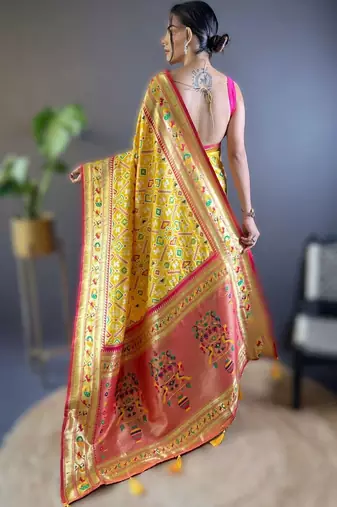 Yellow woven design zari silk blend designer patola saree
