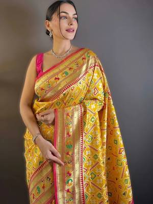 Yellow woven design zari silk blend designer patola saree 5