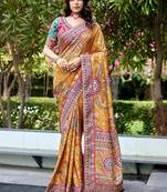 Mustard paisley embroidered designer saree