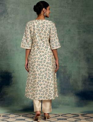 beige floral printed thread work panelled a-line kurta with palazzos 5