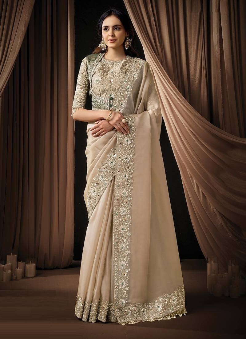 beige zari organza satin dual sequins embroidery multi stone handwork designer saree