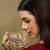 jharokha yellow & emerald green kundan embellished metal clutch