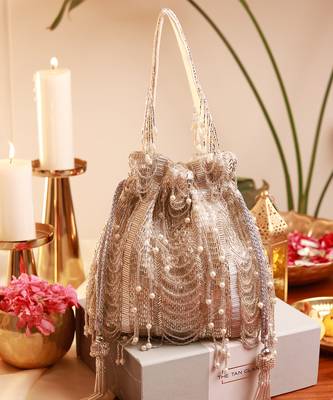 Gold mother of pearl clutch and silver potli bag combo 3