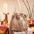 Gold mother of pearl clutch and silver potli bag combo