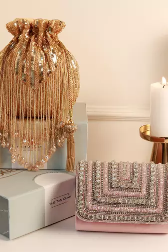 Gold twinkle potli and pink flap bag combo