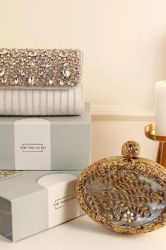 Gold mother of pearl clutch and grace white flap bag combo