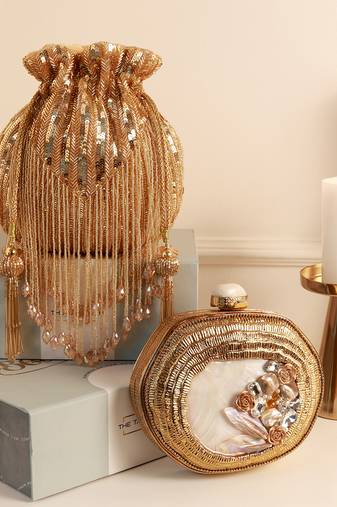 Golden mother of pearl clutch and twinkle gold potli bag combo