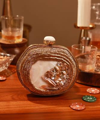 Golden mother of pearl clutch and twinkle gold potli bag combo 3