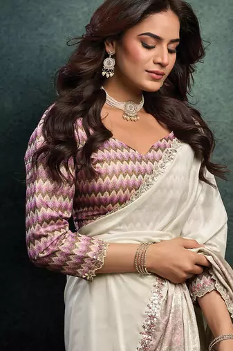 white upada silk blend dual sequince embroidery with pearl handwork designer saree