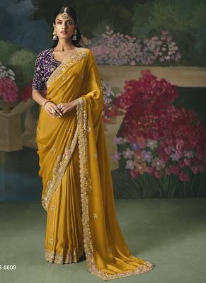 Mustard premium fancy heavy beads work saree 1