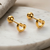 Cupid hollow gold plated stud earring