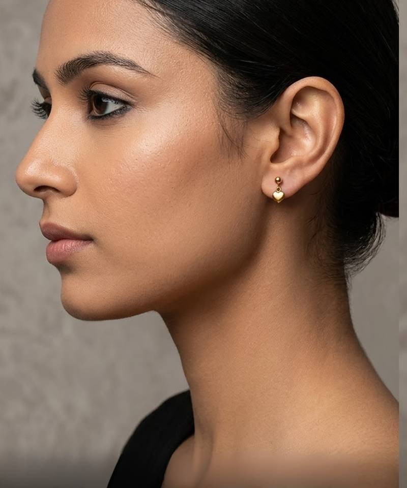 Cupid dangling hearts gold plated stud earring