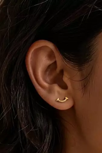 Cupid mini smile gold plated stud earring