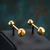 Cupid beveled gold plated stud earring