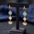 look out heart gold plated hoop earring