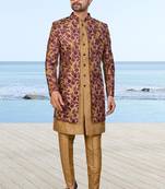 Baige sherwani with purple floral embroidery and matching trousers—perfect for weddings and celebrations.