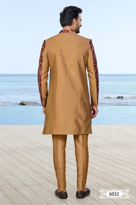 Baige sherwani with purple floral embroidery and matching trousers—perfect for weddings and celebrations. 4