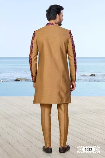 Baige sherwani with purple floral embroidery and matching trousers—perfect for weddings and celebrations.