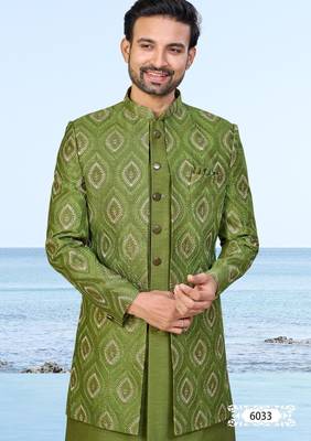 Olive green sherwani with gold detailing and cream trousers—ideal for celebrations. 3