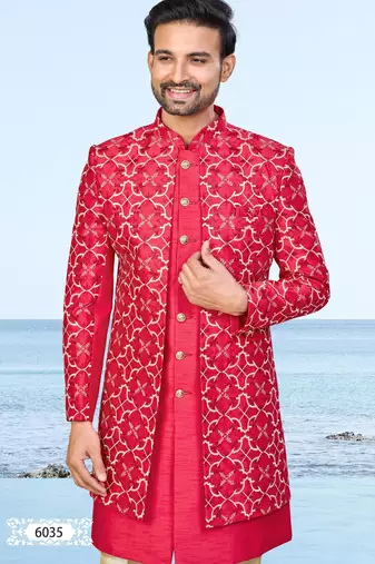 Red sherwani with gold detailing and cream trousers—perfect for weddings and celebrations.