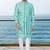 Turquoise sherwani with floral embroidery and white trousers—perfect for weddings.
