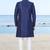 Navy blue sherwani with subtle texture, pocket square, and white trousers—ideal for weddings and formal events.