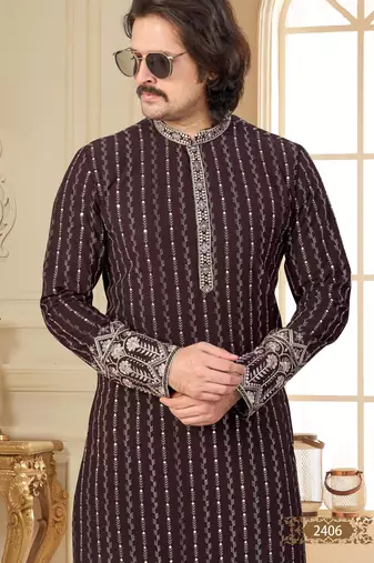 Coffee colour kurta with intricate floral embroidery and cream pajama—perfect for weddings and festive occasions.