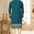 Teal blue embroidered kurta with cream pajama—perfect for festive occasions.